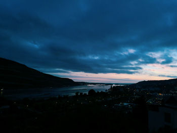 Scenic view of sea against sky at night