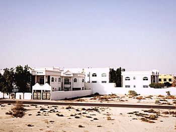 Buildings against clear sky