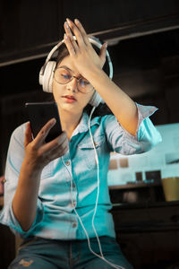 Young woman using mobile phone