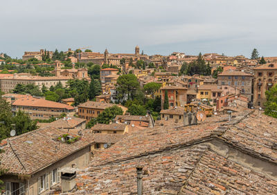 Buildings in city against sky