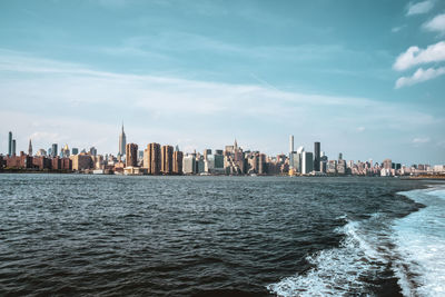 Office buildings and apartments on the skyline at sunset. real estate and travel concept. nyc