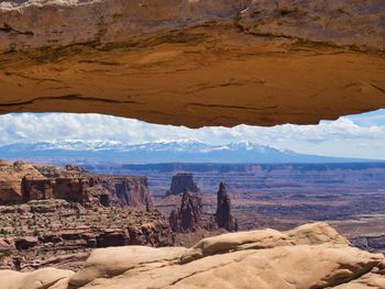 Scenic view of rock formations against sky