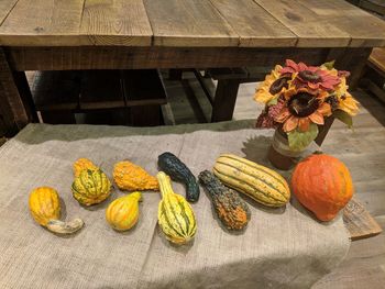 Various flowers on table