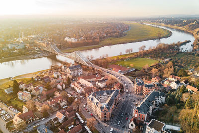 High angle view of river amidst buildings in city