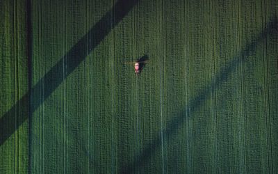 Aerial view of agricultural machinery on field