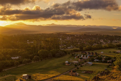 High angle view of townscape against sky during sunset