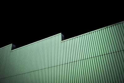 Low angle view of building against sky at night