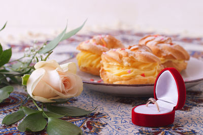 Close-up of rose petals on table