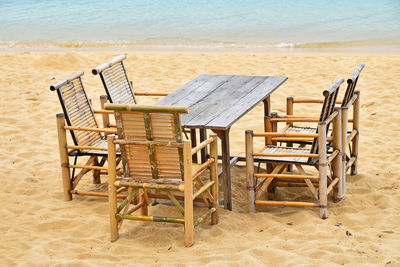 Wooden furniture on sea shore