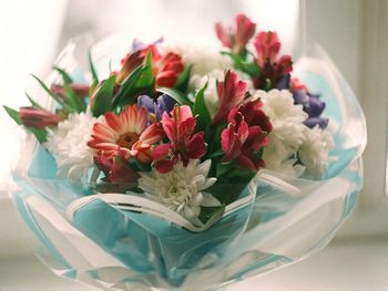 Close-up of flower vase on table