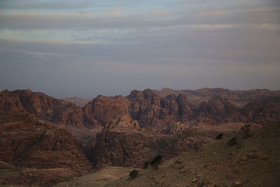 Scenic view of mountains against sky during sunset