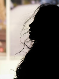 Close-up of woman looking away