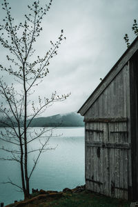 House by sea against sky