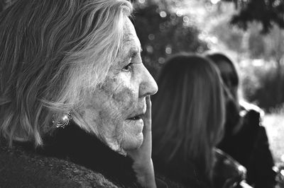 Close-up of senior woman looking away