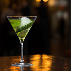 Close-up of wineglass on table