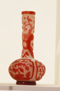 Close-up of colored pencils over white background