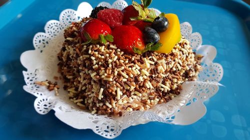 Close-up of fruits in plate on table