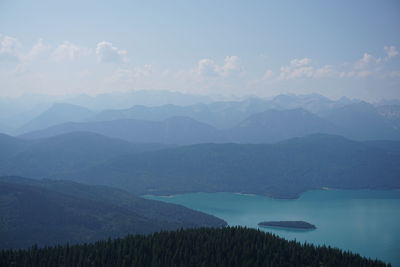 Scenic view of mountains against sky with a lake