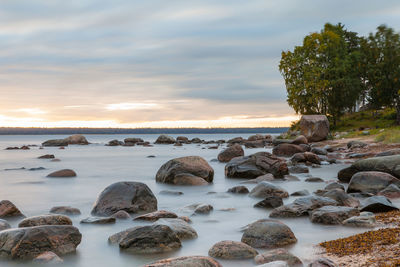 Scenic view of sea against sky at sunset