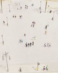High angle view of people playing in city