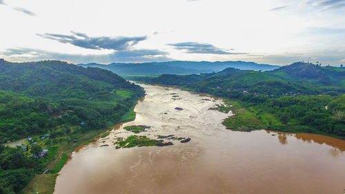 High angle view of landscape with mountain range in background