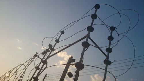 Low angle view of power lines