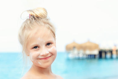 Portrait of smiling woman in swimming pool