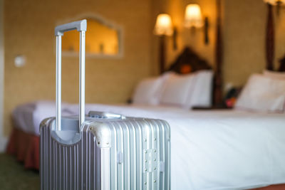 Close-up of luggage in bedroom