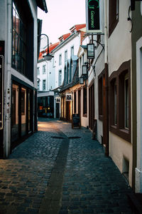 Narrow alley along buildings