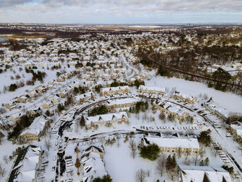 High angle view of snow covered landscape against sky