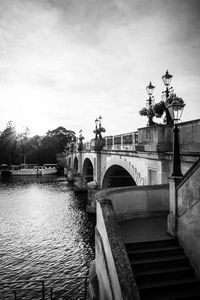 Bridge over river against sky