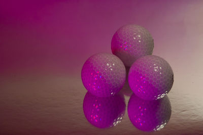 Close-up of pink eggs on table