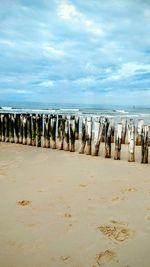 Scenic view of beach against sky