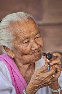 Close-up of woman looking at camera