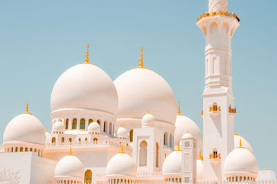 Low angle view of mosque against sky