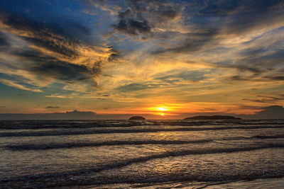 Scenic view of sea against sky during sunset