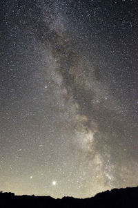 Low angle view of stars against sky at night