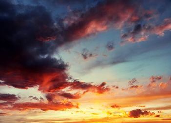 Low angle view of dramatic sky during sunset