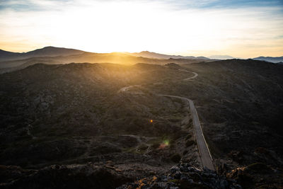 Scenic view of landscape against sky during sunset