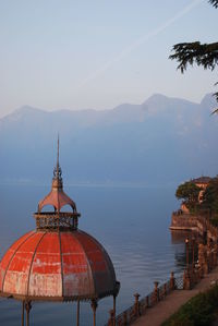 View of tower on mountain against sky