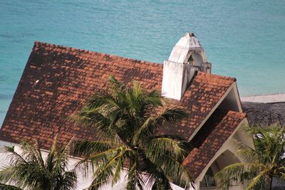 High angle view of swimming pool by building