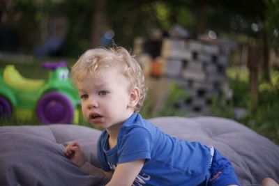 Portrait of cute boy looking away