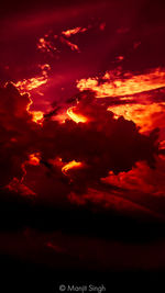 Low angle view of dramatic sky during sunset