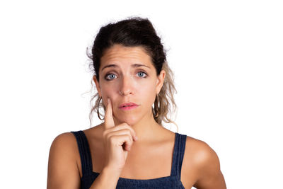 Portrait of woman against white background