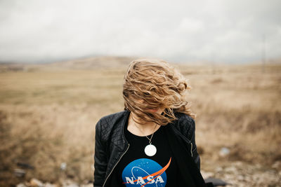 Woman standing on field