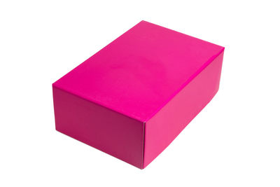 High angle view of pink umbrella against white background