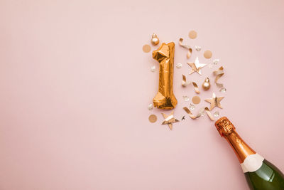 High angle view of beauty products on pink background