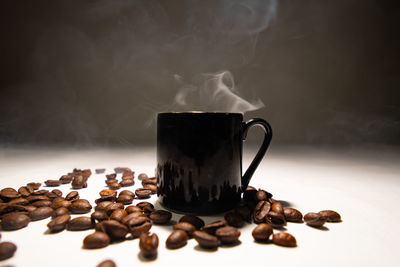 Close-up of coffee beans on table