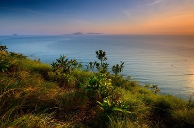 Scenic view of sea against sky during sunset