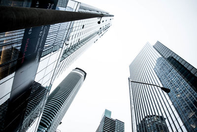 Low angle view of modern buildings against sky